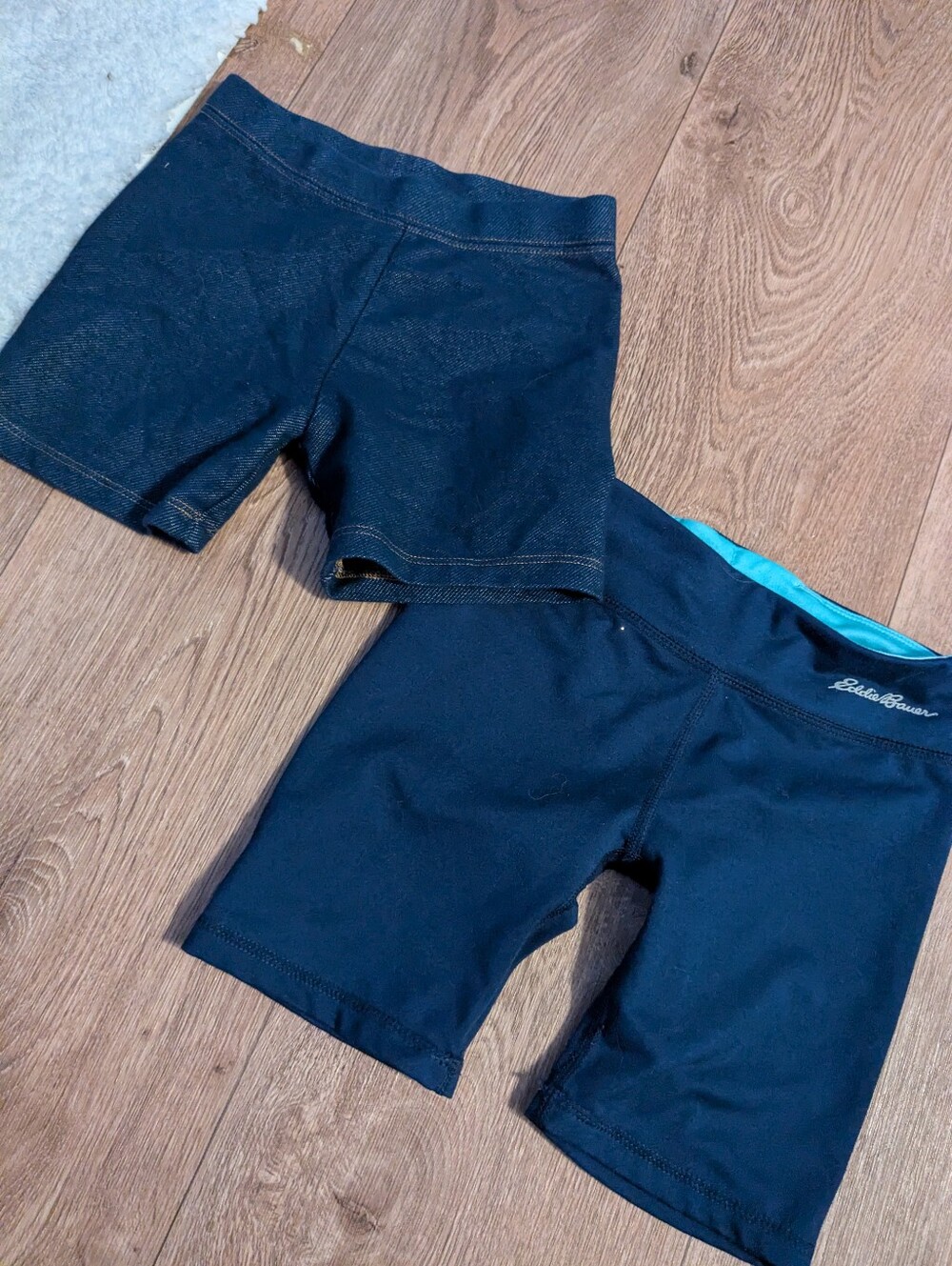 Eddie Bauer Navy and Teal Kids Shorts And A Navy Pair Of Athletic Shorts.